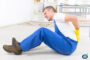 Man worker with back injury, concept of accident at work